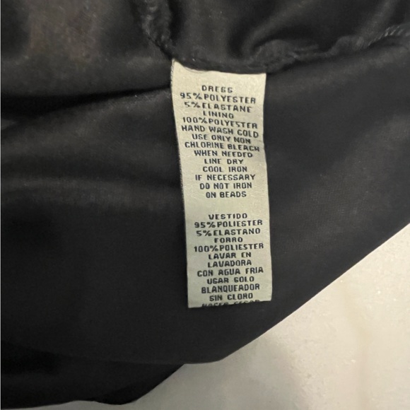 Elegant Black Dress with Embellished Sleeves - Picture 3 of 10